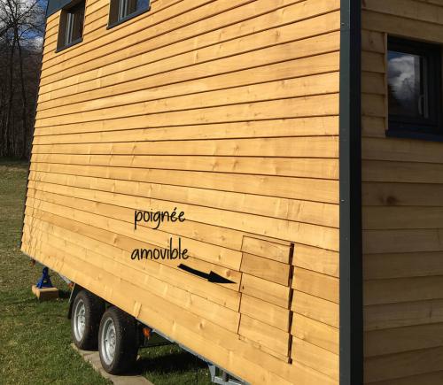 Une trappe face nord permet de sortir le seau directement par l’extérieur.